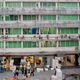 A building full of merchants, shippers and money-transfer services serving African traders. Merchants from Nigeria, Ivory Coast, and Ghana started moving to south China from more established trading hubs like Indonesia and Thailand, after currencies tanked during the Asian financial crisis of the late 1990s.